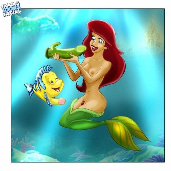 Mermaid fucks with a fish!